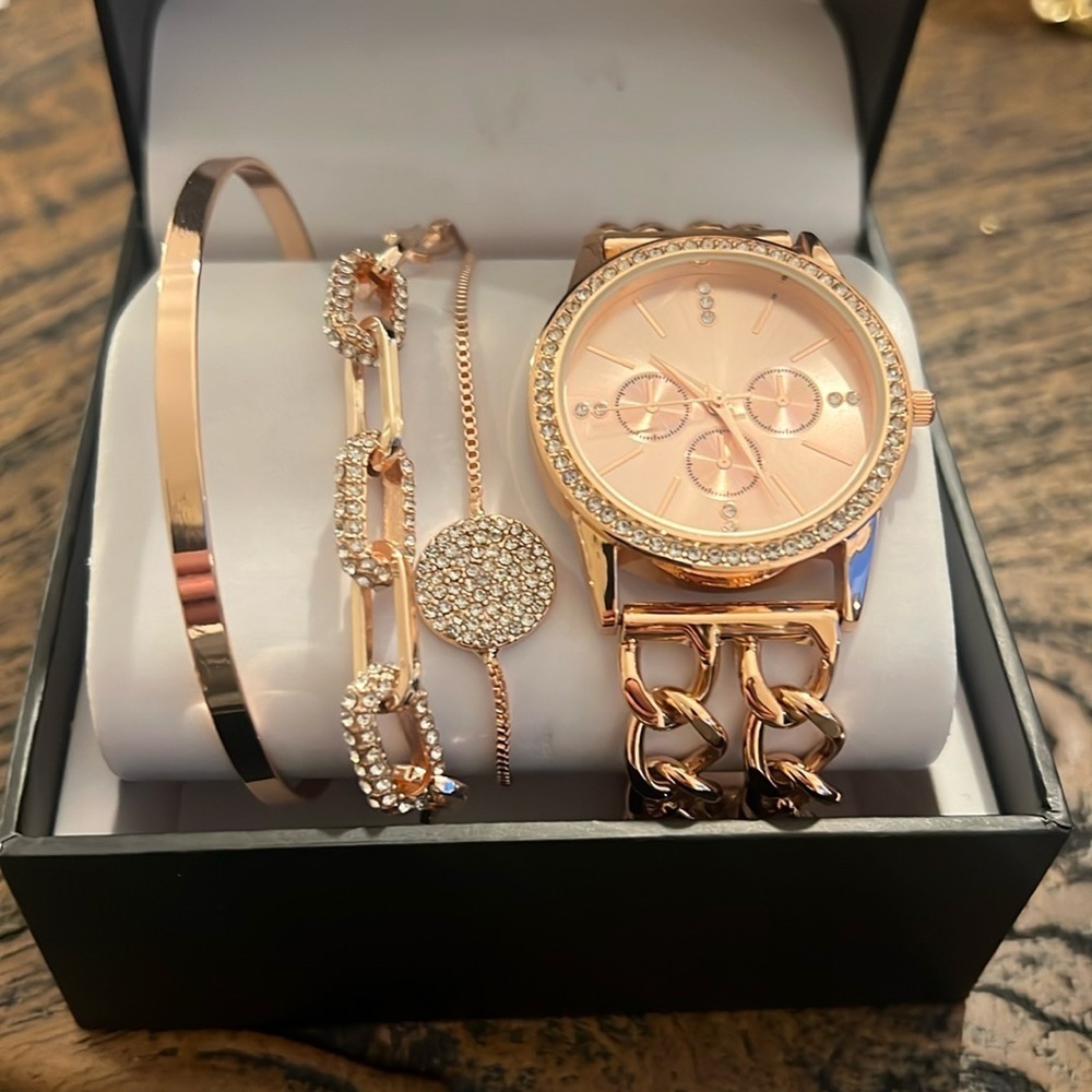 International concepts watch and three rose gold bracelets
